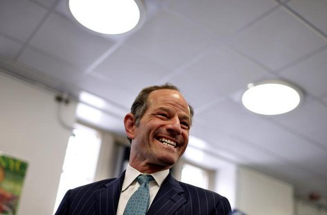 Former New York State Governor and current Democratic candidate for New York City Controller Eliot Spitzer arrives to cast his vote in the D Former New York State Governor and current Democratic candidate for New York City Controller Eliot Spitzer arrives to cast his vote in the D