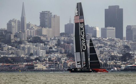 Oracle Team USA sails against the city skyline against Emirates Team New Zealand during Race 3 of the 34th America's Cup yacht sailing race Oracle Team USA sails against the city skyline against Emirates Team New Zealand during Race 3 of the 34th America's Cup yacht sailing race