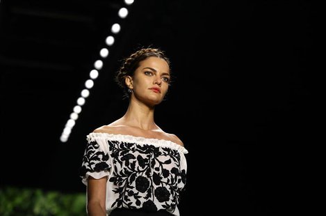 A model presents a creation from Naeem Khan Spring/Summer 2014 collection during New York Fashion Week, September 10, 2013. REUTERS/Joshua L A model presents a creation from Naeem Khan Spring/Summer 2014 collection during New York Fashion Week, September 10, 2013. REUTERS/Joshua L