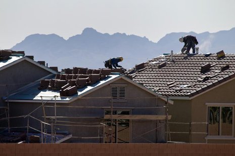 Roofers work on new homes at a residential construction site in the west side of the Las Vegas Valley in Las Vegas, Nevada April 5, 2013. RE Roofers work on new homes at a residential construction site in the west side of the Las Vegas Valley in Las Vegas, Nevada April 5, 2013. RE