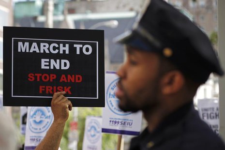 Demonstrators march during a protest in New York June 17, 2012. REUTERS/Eduardo Munoz Demonstrators march during a protest in New York June 17, 2012. REUTERS/Eduardo Munoz