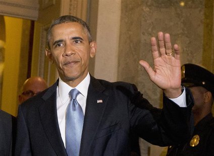 U.S. President Barack Obama walks between meetings on Syria with U.S. Senate Republicans and Democrats, on Capitol Hill in Washington, Septe U.S. President Barack Obama walks between meetings on Syria with U.S. Senate Republicans and Democrats, on Capitol Hill in Washington, Septe