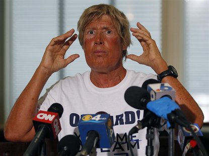 U.S. long-distance swimmer Diana Nyad, 64, who completed her swim from Cuba to Key West, Florida, speaks at a news conference on Stock Islan U.S. long-distance swimmer Diana Nyad, 64, who completed her swim from Cuba to Key West, Florida, speaks at a news conference on Stock Islan