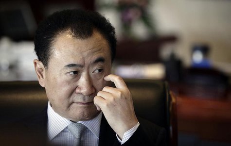 Wang Jianlin, chairman of Dalian Wanda Group, touches his face during an interview at his office in the company's headquarters in Beijing De Wang Jianlin, chairman of Dalian Wanda Group, touches his face during an interview at his office in the company's headquarters in Beijing De