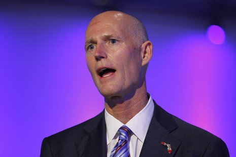 Florida Republican Gov. Rick Scott speaks at a ceremony opening new newsroom facilities for the Univision and Fusion television networks in Florida Republican Gov. Rick Scott speaks at a ceremony opening new newsroom facilities for the Univision and Fusion television networks in