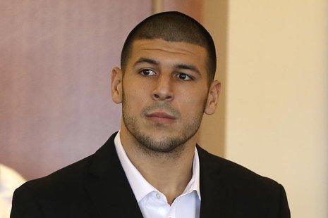 Aaron Hernandez, former player for the NFL's New England Patriots football team, stands during his arraignment in the Bristol County Superio Aaron Hernandez, former player for the NFL's New England Patriots football team, stands during his arraignment in the Bristol County Superio
