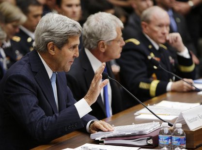 U.S. Secretary of State John Kerry (L-R), Defense Secretary Chuck Hagel and Chairman of the Joint Chiefs of Staff U.S. Army General Martin D U.S. Secretary of State John Kerry (L-R), Defense Secretary Chuck Hagel and Chairman of the Joint Chiefs of Staff U.S. Army General Martin D