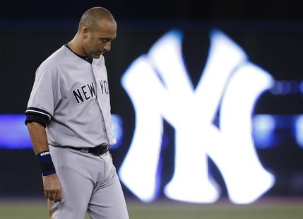 New York Yankees' Derek Jeter reacts after the end of the first inning against the Toronto Blue Jays in their MLB American League baseball g New York Yankees' Derek Jeter reacts after the end of the first inning against the Toronto Blue Jays in their MLB American League baseball g