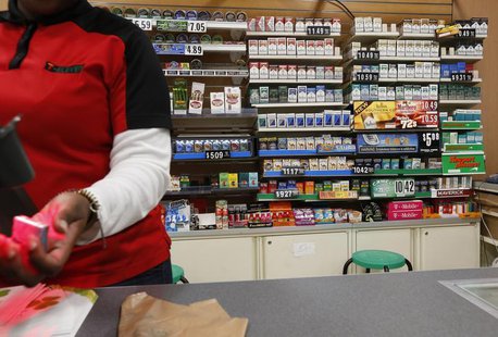 Cigarettes are displayed behind the counter of a convenient store in New York, March 18, 2013. REUTERS/Brendan McDermid Cigarettes are displayed behind the counter of a convenient store in New York, March 18, 2013. REUTERS/Brendan McDermid