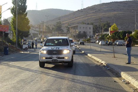 U.N. peacekeeping inspectors leave the Masnaa border crossing between Lebanon and Syria, August 31, 2013. REUTERS/Hassan Abdallah U.N. peacekeeping inspectors leave the Masnaa border crossing between Lebanon and Syria, August 31, 2013. REUTERS/Hassan Abdallah