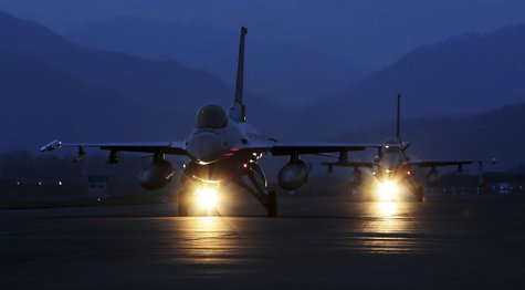 KF-16 fighter jets of the South Korean air force prepare to take off during a night flight operation at an air base in Chungju, about 100 km KF-16 fighter jets of the South Korean air force prepare to take off during a night flight operation at an air base in Chungju, about 100 km