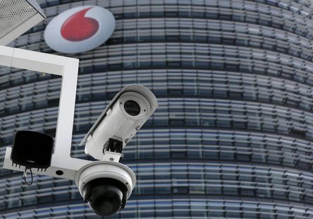 A surveillance camera is pictured in front of the headquarters of Vodafone Germany in Duesseldorf September 12, 2013. REUTERS/Ina Fassbender A surveillance camera is pictured in front of the headquarters of Vodafone Germany in Duesseldorf September 12, 2013. REUTERS/Ina Fassbender