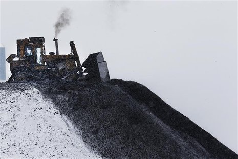 A bulldozer spreads processed coal at the Century Mine near Beallsville, Ohio, January 25, 2013. REUTERS/Jason Cohn A bulldozer spreads processed coal at the Century Mine near Beallsville, Ohio, January 25, 2013. REUTERS/Jason Cohn