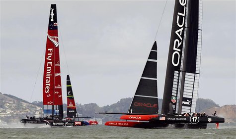 Emirates Team New Zealand (L) takes a lead against Oracle Team USA during Race 5 of the 34th America's Cup yacht sailing race in San Francis Emirates Team New Zealand (L) takes a lead against Oracle Team USA during Race 5 of the 34th America's Cup yacht sailing race in San Francis