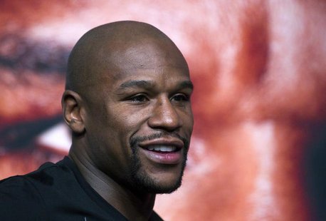 Undefeated boxer Floyd Mayweather Jr. of the U.S. attends a news conference at the MGM Grand Hotel and Casino in Las Vegas, Nevada September Undefeated boxer Floyd Mayweather Jr. of the U.S. attends a news conference at the MGM Grand Hotel and Casino in Las Vegas, Nevada September