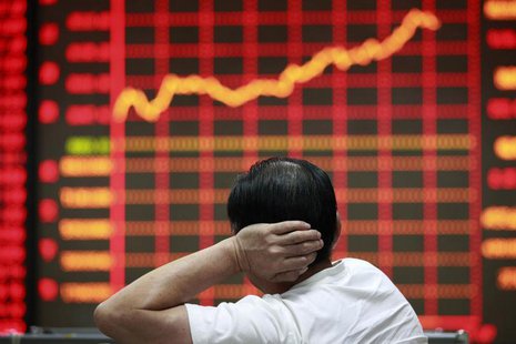 An investor looks at an electronic board showing stock information at a brokerage house in Huaibei, Anhui province September 9, 2013. REUTER An investor looks at an electronic board showing stock information at a brokerage house in Huaibei, Anhui province September 9, 2013. REUTER