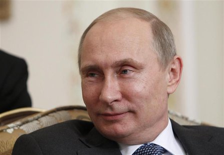 Russian President Vladimir Putin looks on during his meeting with Crown Prince of Abu Dhabi Sheikh Mohammed bin Zayed al-Nahyan at the Novo- Russian President Vladimir Putin looks on during his meeting with Crown Prince of Abu Dhabi Sheikh Mohammed bin Zayed al-Nahyan at the Novo-