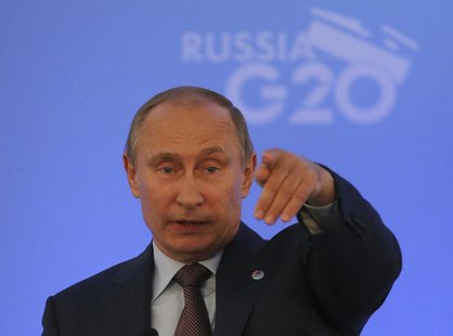 Russian President Vladimir Putin speaks to the media during a news conference at the G20 summit in St.Petersburg September 6, 2013. REUTERS/ Russian President Vladimir Putin speaks to the media during a news conference at the G20 summit in St.Petersburg September 6, 2013. REUTERS/