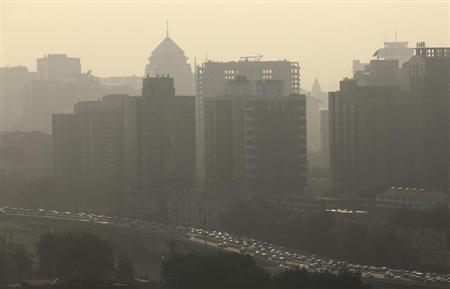 Vehicles past apartment blocks during rush hour in Beijing July 11, 2013.
Credit: Reuters/Jason Lee Vehicles past apartment blocks during rush hour in Beijing July 11, 2013.
Credit: Reuters/Jason Lee