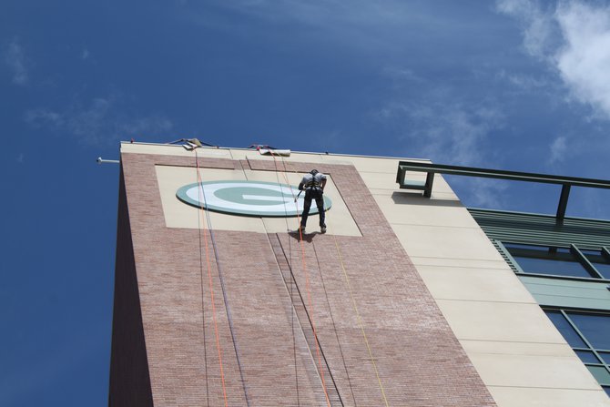 Tanner rappels down Lambeau Field