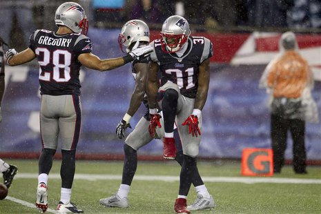 New England Patriots Aqib Talib (31) celebrates with Steve Gregory his first interception against the New York Jets during their NFL AFC Eas New England Patriots Aqib Talib (31) celebrates with Steve Gregory his first interception against the New York Jets during their NFL AFC Eas