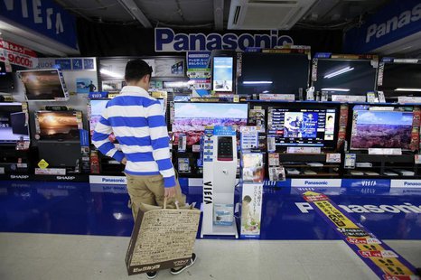 A man looks at Panasonic Corp's Viera TVs displayed at an electronics store in Tokyo October 28, 2012. REUTERS/Yuriko Nakao A man looks at Panasonic Corp's Viera TVs displayed at an electronics store in Tokyo October 28, 2012. REUTERS/Yuriko Nakao