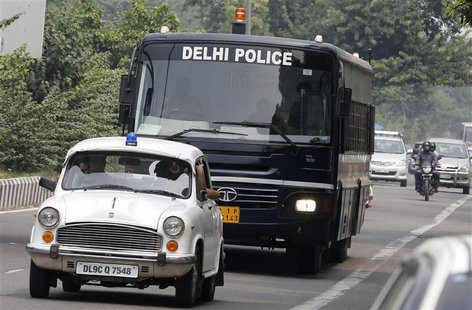 A police bus carrying four men who were found guilty of the fatal gang-rape of a young woman on a bus, arrives at a court in New Delhi Septe A police bus carrying four men who were found guilty of the fatal gang-rape of a young woman on a bus, arrives at a court in New Delhi Septe