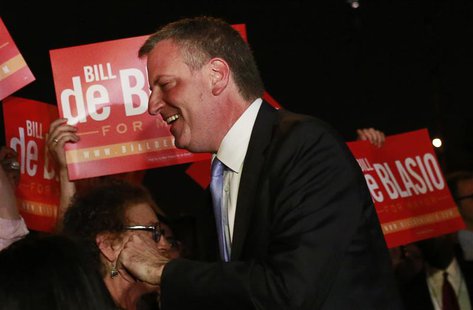 Democratic candidate for New York City mayor Bill de Blasio speaks with supporters before a mayoral primary results party in New York Septem Democratic candidate for New York City mayor Bill de Blasio speaks with supporters before a mayoral primary results party in New York Septem