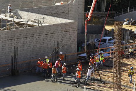 Construction workers are seen on the job building a shopping center complex in Solana Beach, California January 6, 2012. REUTERS/Mike Blake Construction workers are seen on the job building a shopping center complex in Solana Beach, California January 6, 2012. REUTERS/Mike Blake