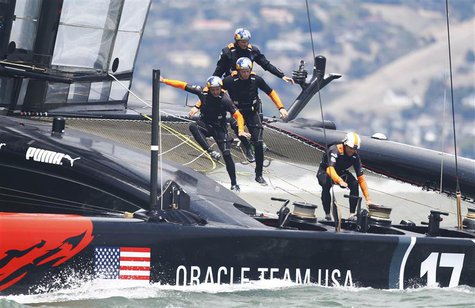 Oracle Team USA team trains on their AC72 catamaran on San Francisco Bay, California in this August 6, 2013 file photo. REUTERS/Peter Andrew Oracle Team USA team trains on their AC72 catamaran on San Francisco Bay, California in this August 6, 2013 file photo. REUTERS/Peter Andrew