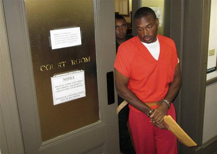 Convicted killer Aundra Akins leaves a courtroom in Monticello, Florida, September 13, 2013 after being resentenced to 40 years in prison fo Convicted killer Aundra Akins leaves a courtroom in Monticello, Florida, September 13, 2013 after being resentenced to 40 years in prison fo