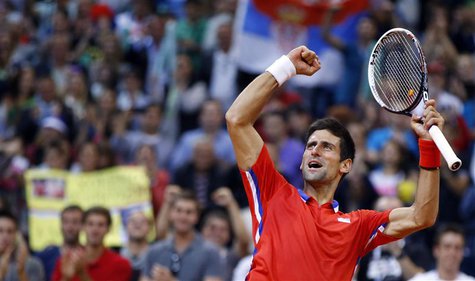 Serbia's Novak Djokovic celebrates his victory over Canada's Vasek Pospisil after their Davis Cup semi-final tennis match in Belgrade Septem Serbia's Novak Djokovic celebrates his victory over Canada's Vasek Pospisil after their Davis Cup semi-final tennis match in Belgrade Septem
