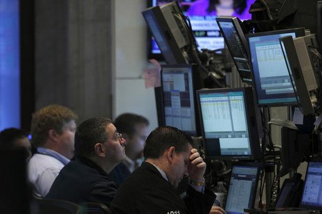 Traders work on the floor of the New York Stock Exchange, September 13, 2013. REUTERS/Brendan McDermid Traders work on the floor of the New York Stock Exchange, September 13, 2013. REUTERS/Brendan McDermid