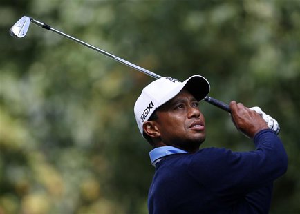Tiger Woods of the U.S. hits from the second tee during the second round of the BMW Championship golf tournament at the Conway Farms Golf Cl Tiger Woods of the U.S. hits from the second tee during the second round of the BMW Championship golf tournament at the Conway Farms Golf Cl