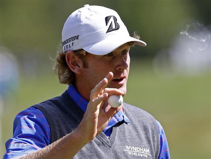Brandt Snedeker of the U.S. acknowledges the crowd after sinking a putt on the ninth hole during the second round of the BMW Championship go Brandt Snedeker of the U.S. acknowledges the crowd after sinking a putt on the ninth hole during the second round of the BMW Championship go