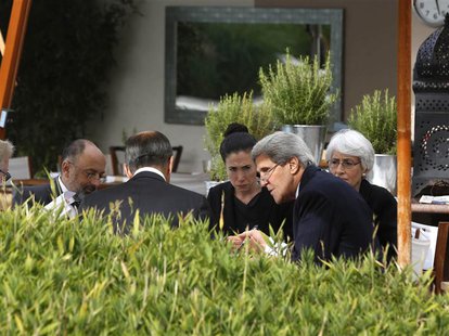U.S. Secretary of State John Kerry (2nd R) and Russian Foreign Minister Sergei Lavrov (back to camera) negotiate ongoing problems in Syria, U.S. Secretary of State John Kerry (2nd R) and Russian Foreign Minister Sergei Lavrov (back to camera) negotiate ongoing problems in Syria,