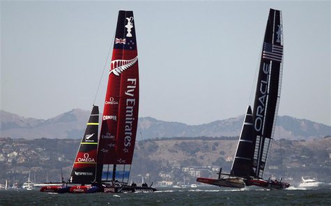 Emirates Team New Zealand (L) takes the early lead against Oracle Team USA during Race 1 of the 34th America's Cup yacht sailing race in San Emirates Team New Zealand (L) takes the early lead against Oracle Team USA during Race 1 of the 34th America's Cup yacht sailing race in San