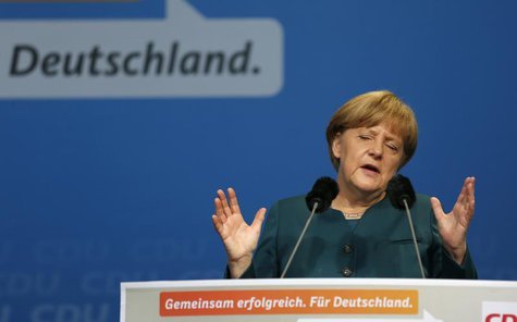German Chancellor and head of the Christian Democratic Union (CDU) Angela Merkel gives a speech during a CDU election campaign event in Osna German Chancellor and head of the Christian Democratic Union (CDU) Angela Merkel gives a speech during a CDU election campaign event in Osna