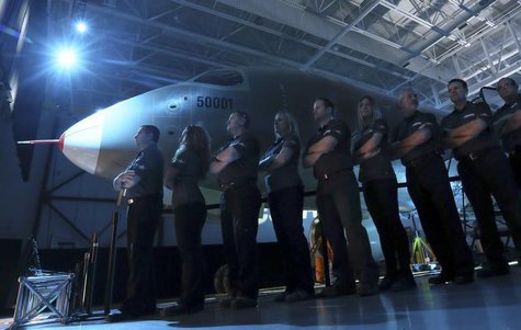 Bombardier employees form a line as the CSeries aircraft is unveiled at a news conference at its assembly facility in Mirabel, Quebec, March Bombardier employees form a line as the CSeries aircraft is unveiled at a news conference at its assembly facility in Mirabel, Quebec, March