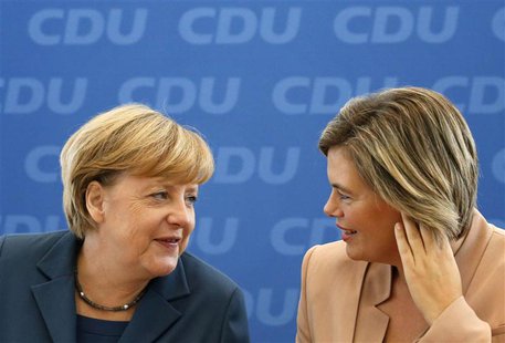 German Chancellor Angela Merkel and leader of the Christian Democratic Union party (CDU) chats with Julia Kloeckner (R) from the CDU of the German Chancellor Angela Merkel and leader of the Christian Democratic Union party (CDU) chats with Julia Kloeckner (R) from the CDU of the