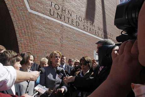 Massachusetts Attorney General Martha Coakley (C) speaks to reporters outside the U.S. District Court after attending a hearing before a fed Massachusetts Attorney General Martha Coakley (C) speaks to reporters outside the U.S. District Court after attending a hearing before a fed