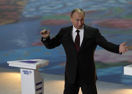 Russian President Vladimir Putin gestures during a ceremony to launch a countdown clock for the 2014 Winter Olympics in the Bolshoi Ice Dome Russian President Vladimir Putin gestures during a ceremony to launch a countdown clock for the 2014 Winter Olympics in the Bolshoi Ice Dome
