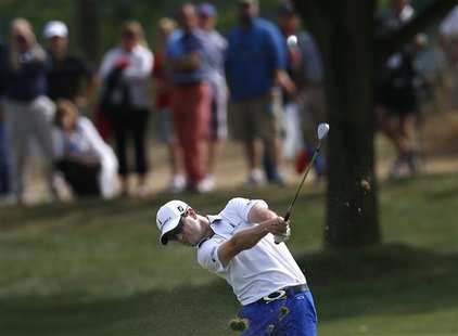 Zach Johnson of U.S. hits from the ninth fairway during the third round of the BMW Championship golf tournament at the Conway Farms Golf Clu Zach Johnson of U.S. hits from the ninth fairway during the third round of the BMW Championship golf tournament at the Conway Farms Golf Clu