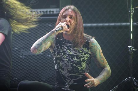 Singer Tim Lambesis of As I Lay Dying performs at the 2nd annual Golden Gods awards in Los Angeles, in this April 8, 2010 file photo. REUTER Singer Tim Lambesis of As I Lay Dying performs at the 2nd annual Golden Gods awards in Los Angeles, in this April 8, 2010 file photo. REUTER