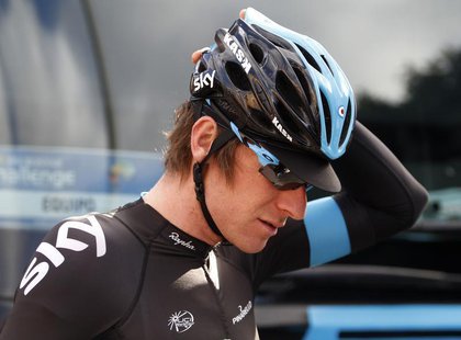 Tour de France and Olympic time trial champion Bradley Wiggins of Britain gestures before the start of the 4th stage of the Challenge tour o Tour de France and Olympic time trial champion Bradley Wiggins of Britain gestures before the start of the 4th stage of the Challenge tour o