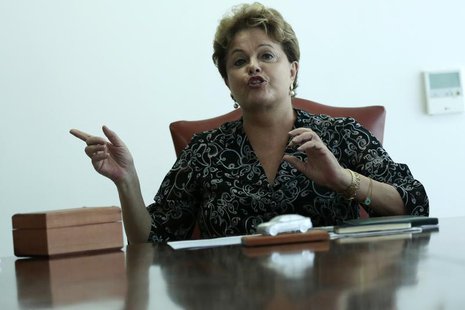 Brazil's President Dilma Rousseff gestures during a meeting with Audi CEO Rupert Stadler at the Planalto Palace in Brasilia September 17, 20 Brazil's President Dilma Rousseff gestures during a meeting with Audi CEO Rupert Stadler at the Planalto Palace in Brasilia September 17, 20