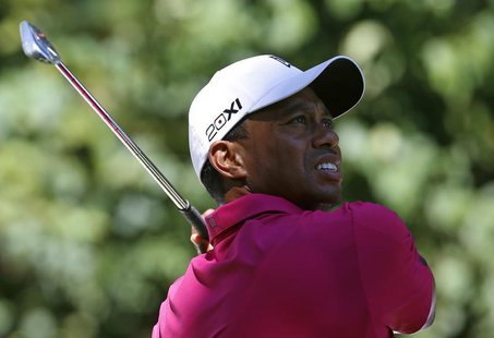 Tiger Woods of the U.S. hits from the second tee during the third round of the BMW Championship golf tournament at the Conway Farms Golf Clu Tiger Woods of the U.S. hits from the second tee during the third round of the BMW Championship golf tournament at the Conway Farms Golf Clu