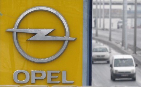 The logo of the carmaker Opel is seen on a roadside in Istanbul February 17, 2012. REUTERS/Osman Orsal The logo of the carmaker Opel is seen on a roadside in Istanbul February 17, 2012. REUTERS/Osman Orsal