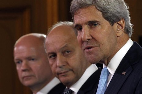 U.S. Secretary of State John Kerry (R), British Foreign Secretary William Hague (L) and French Foreign Minister Laurent Fabius attend a news U.S. Secretary of State John Kerry (R), British Foreign Secretary William Hague (L) and French Foreign Minister Laurent Fabius attend a news