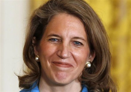 Nominee for Director of the White House Office of Management and Budget Sylvia Mathews Burwell listens to U.S. President Barack Obama in the Nominee for Director of the White House Office of Management and Budget Sylvia Mathews Burwell listens to U.S. President Barack Obama in the